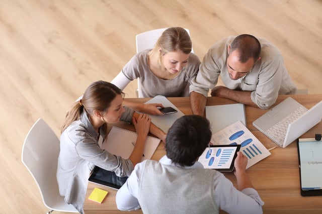 Business meeting around table